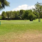 Between Golf And Apartman *